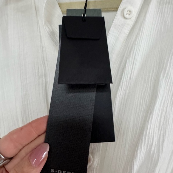 NWT SDEER Women's  Asymmetrical Blouse size small
Color- white - Picture 9 of 10